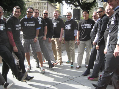 Guys Roll Up Pant Legs and Hobble a Mile in Her Shoes Guys Roll Up Pant Legs and Hobble a Mile in Her Shoes