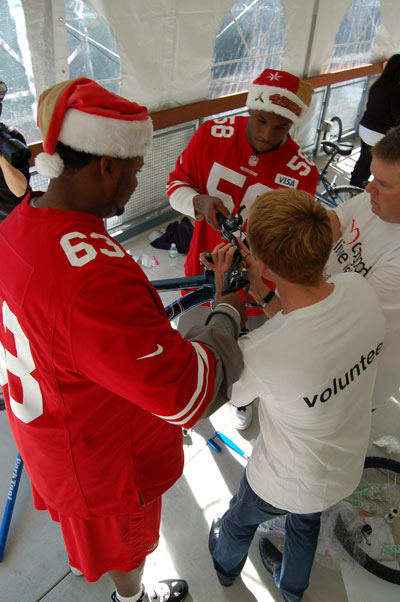 49ers Stars Bring Joy to Children; Build Bikes for Children 49ers Stars Bring Joy to Children; Build Bikes for Children
