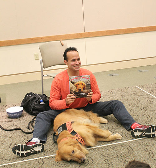 Former U.S. Army Captain and Service Dog Make Library Appearance Former U.S. Army Captain and Service Dog Make Library Appearance