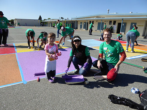 Comcast Volunteers Brighten Hughes Elementary School Comcast Volunteers Brighten Hughes Elementary School